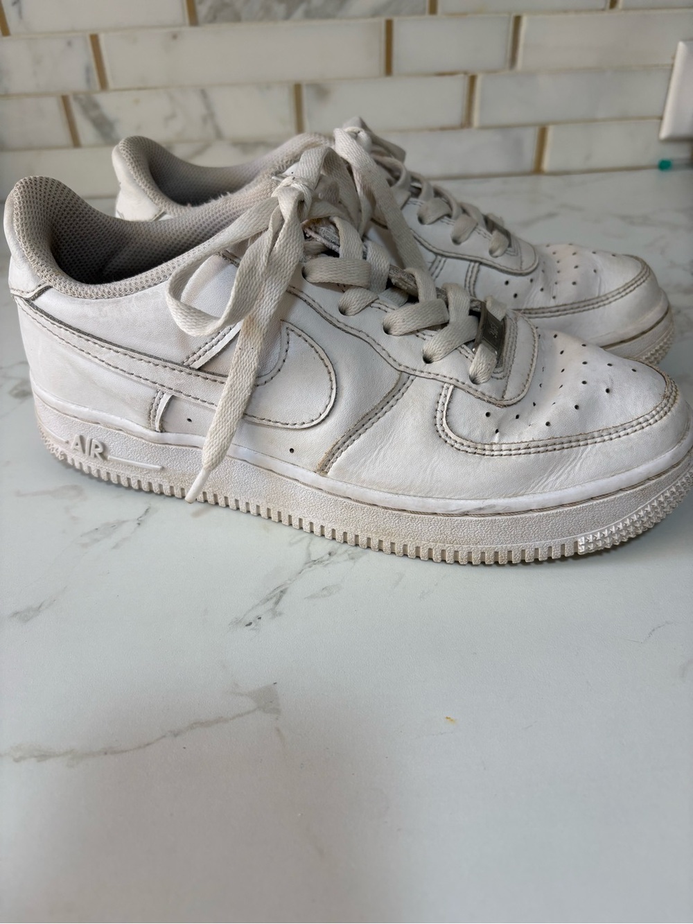Nike Air force 1's triple white low top sneaker size 5.5Y